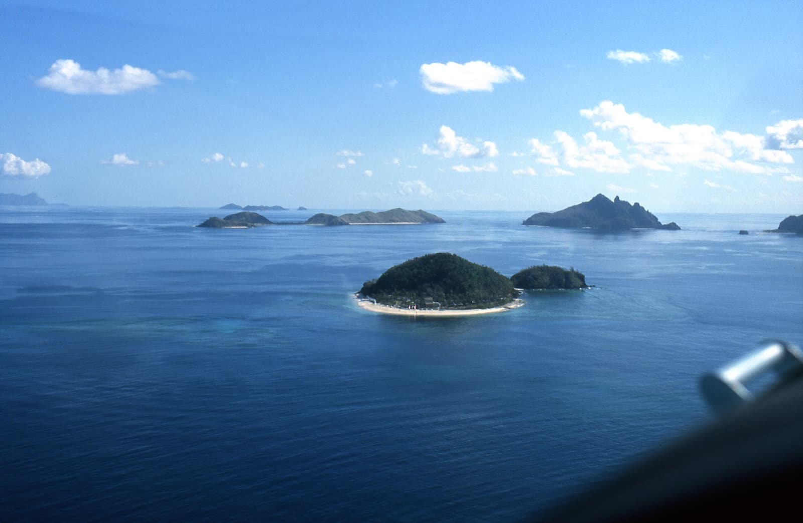 Aerial view of small volcanic islands in the Mamanuca group