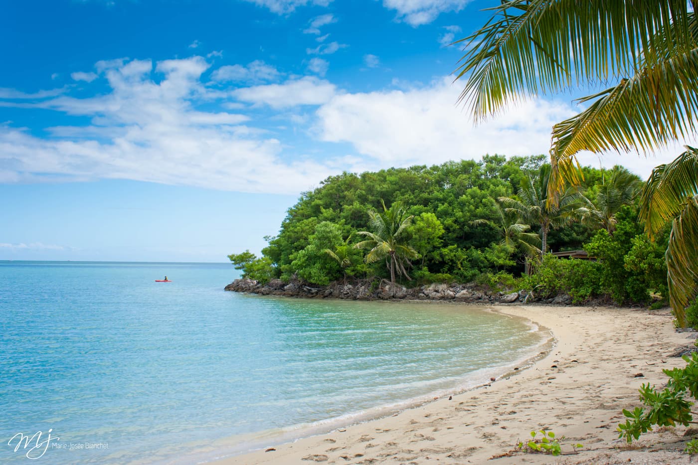 A quiet curve of white sand and clear shallow water on Malolo Lailai